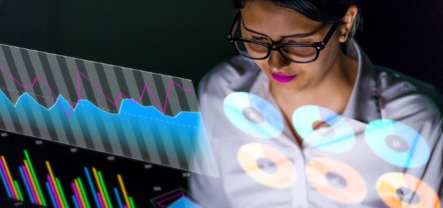 Latina businesswoman looking at various business information